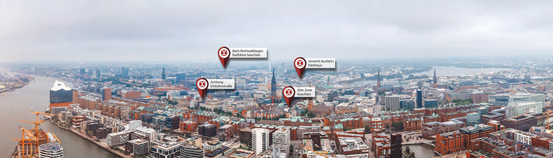 Drivers Cam ist dein Prüfgebiet auf dem Handy Handy mit DriversCam vor Luftaufnahme von Stadt